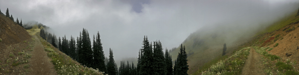 Panorama photo of hiking at Crystal Mountain on a foggy day