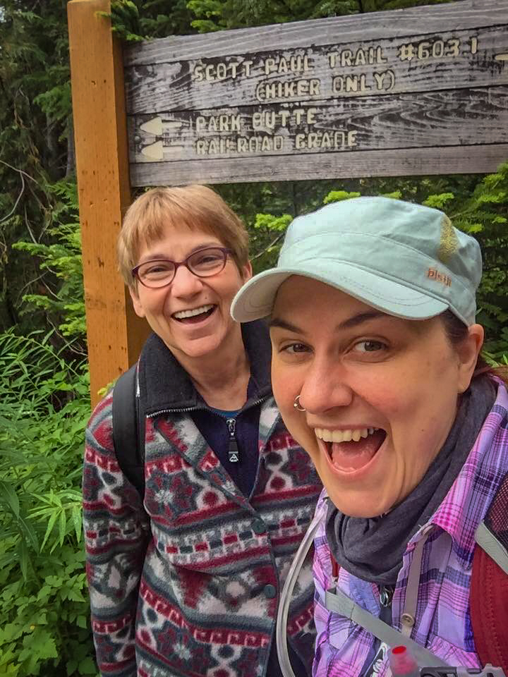 Mother and daughter selfie at the trailhead sign for Scott Paul Trail #6031