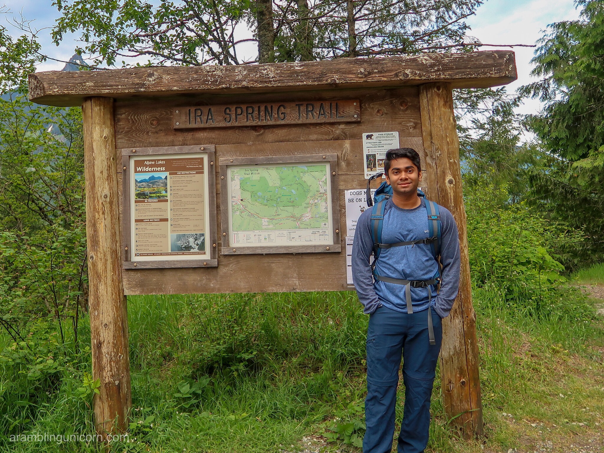 Ash Poses at the Ira Spring Trailhead Sign