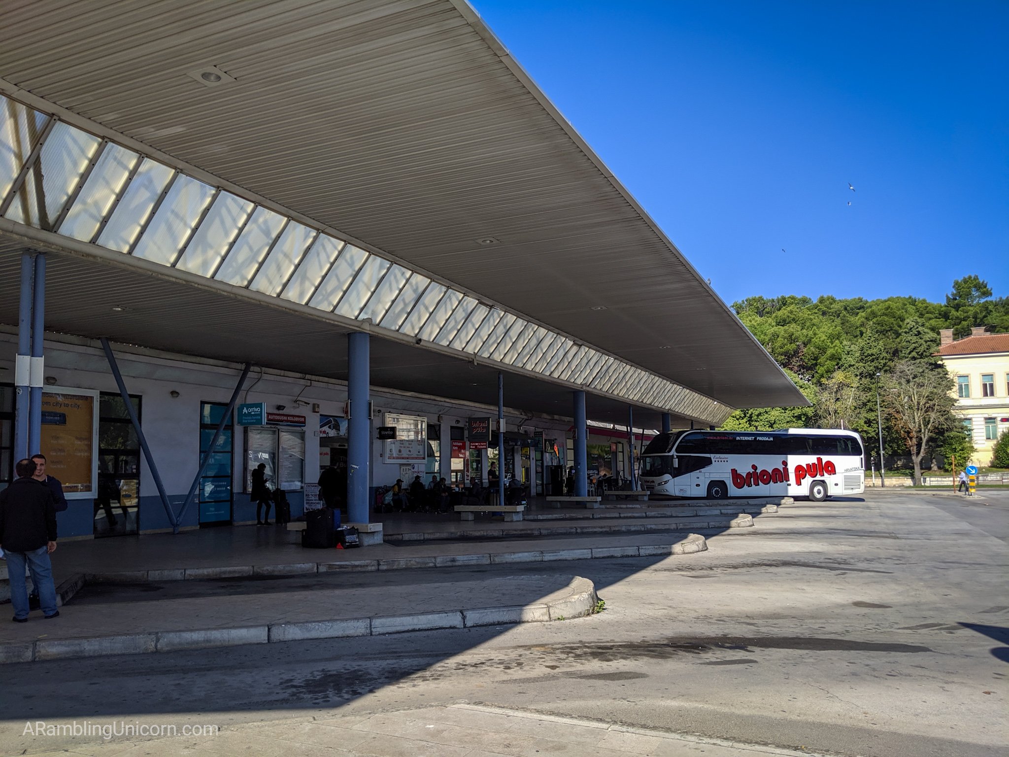 The Pula bus station with some bus parking spots.