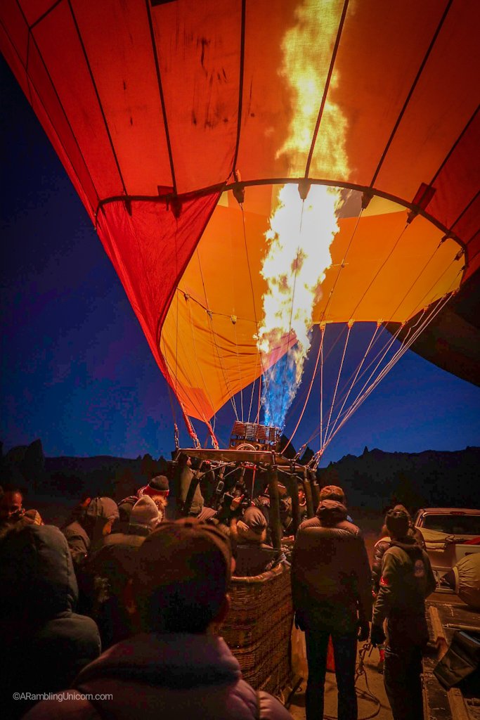 Climbing into the basket with 23 of my new closest friends as we set off on a Cappadocia balloon ride.