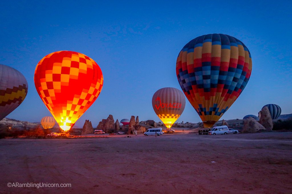 Watching the nearby balloons prepare for takeoff for a Cappadocia balloon ride.
