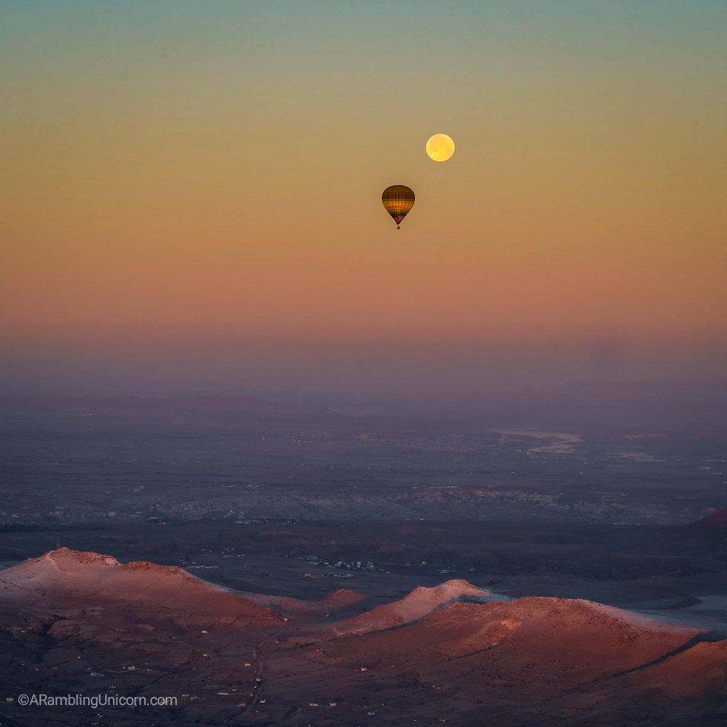 Cappadocia balloon ride with a full moon.