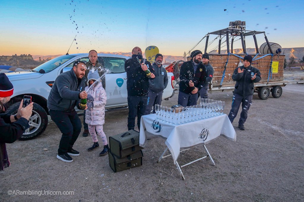 The Cappadocia balloon ride is over. Champagne celebration!