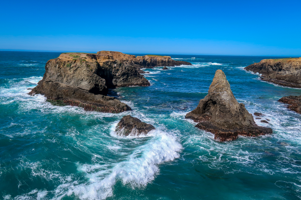 View of the rugged coastline and crashing waves at Mendocino Headlands State Park