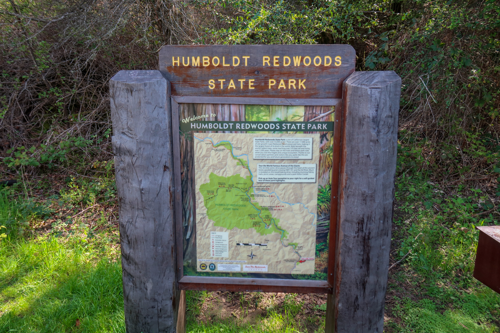 Humboldt Redwoods State Park sign at the beginning of the Avenue of the Giants auto tour, including a detailed map of the route.