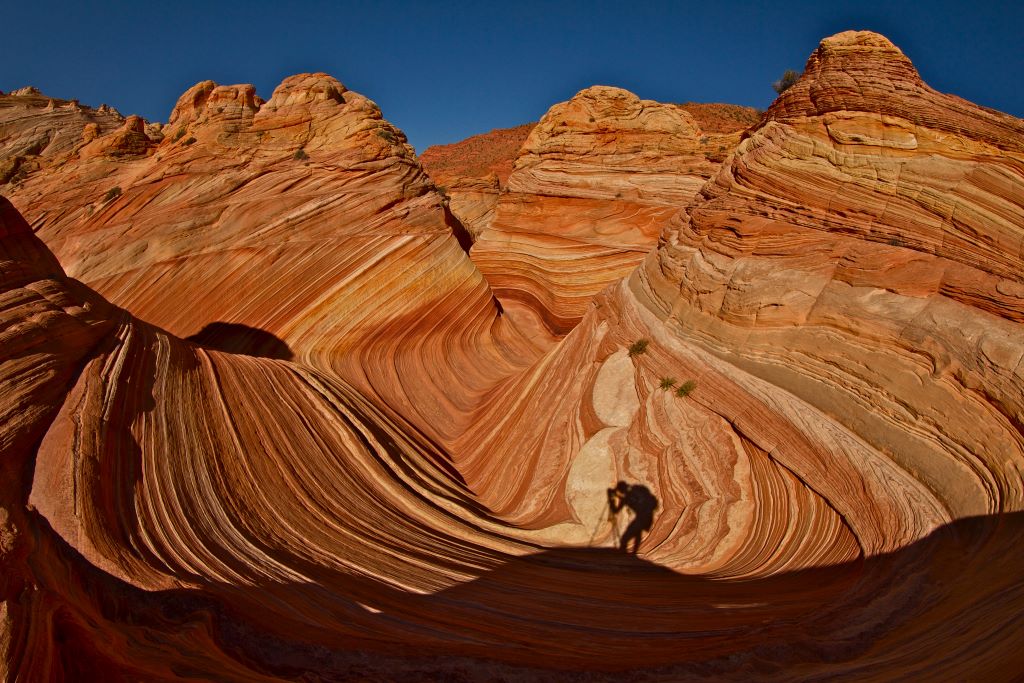 The Wave, a wavy section of cliffs lined with red sandstone in Vermilion Cliffs National Monument.